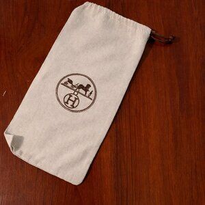 Hermes Cream Drawstring Bag for Storage Purposes